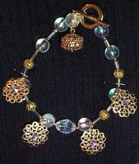 necklace, handmade, custom jewelry, bracelet, earrings, pendant, arouraborealis, swarovski crystals, czech glass, gold tone, dangle charm