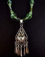 praseolite necklace mounted in sterling silver mount with bavarian crystals