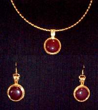 Necklace, round, 20mm, goldtone, bead edged pendant, Omega, cranberry carnelian, cabochon